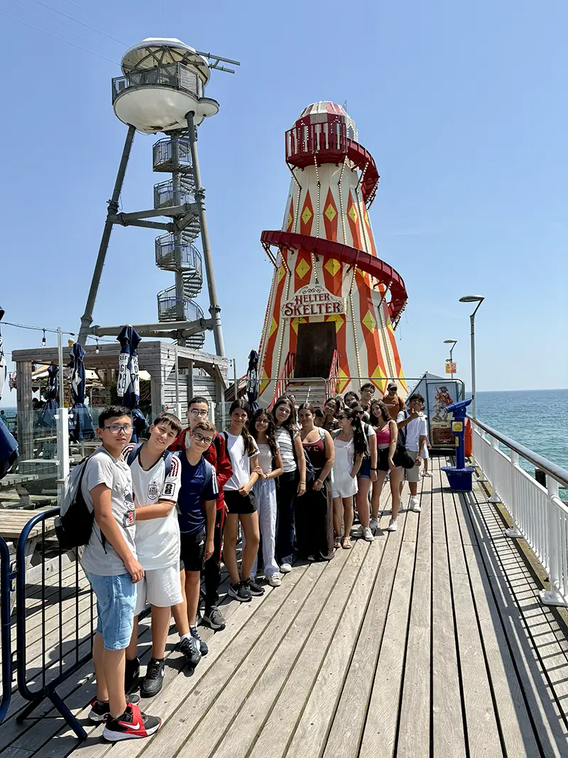 Students on bournemouth pier on a school excursion