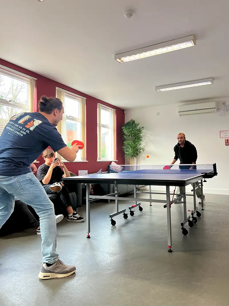 Students playing table tennis
