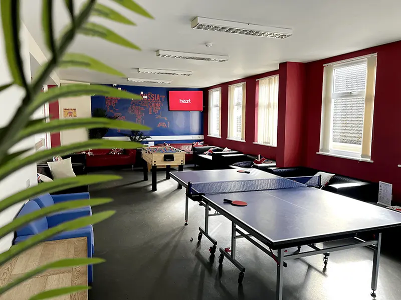 Table tennis and table football in cafe