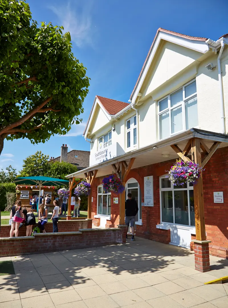 School entrance with hanging baskets