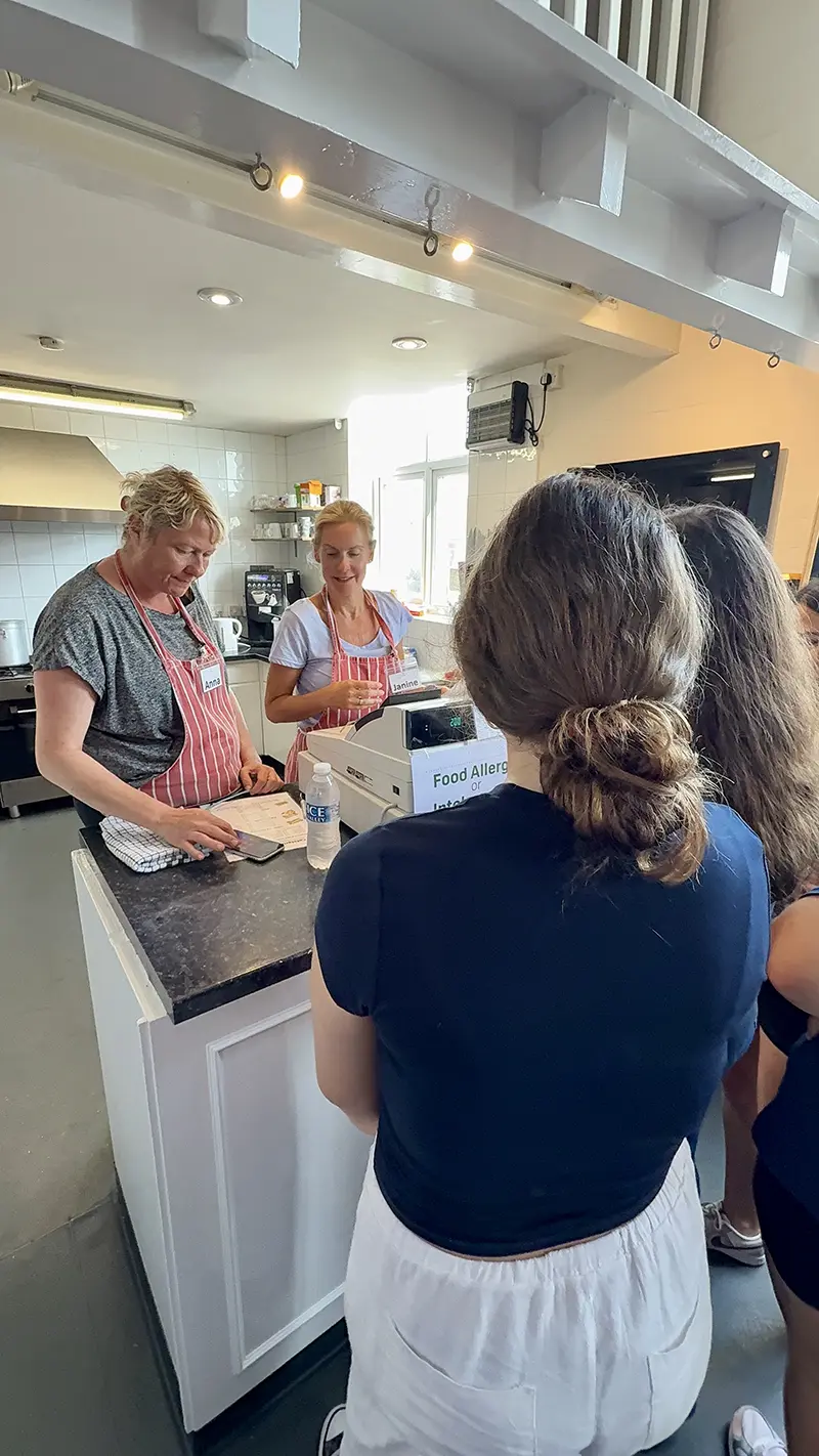 Students ordering from school cafe at Southbourne School
