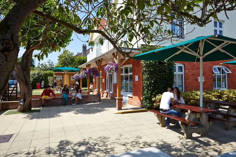 Students parasols at Southbourne School