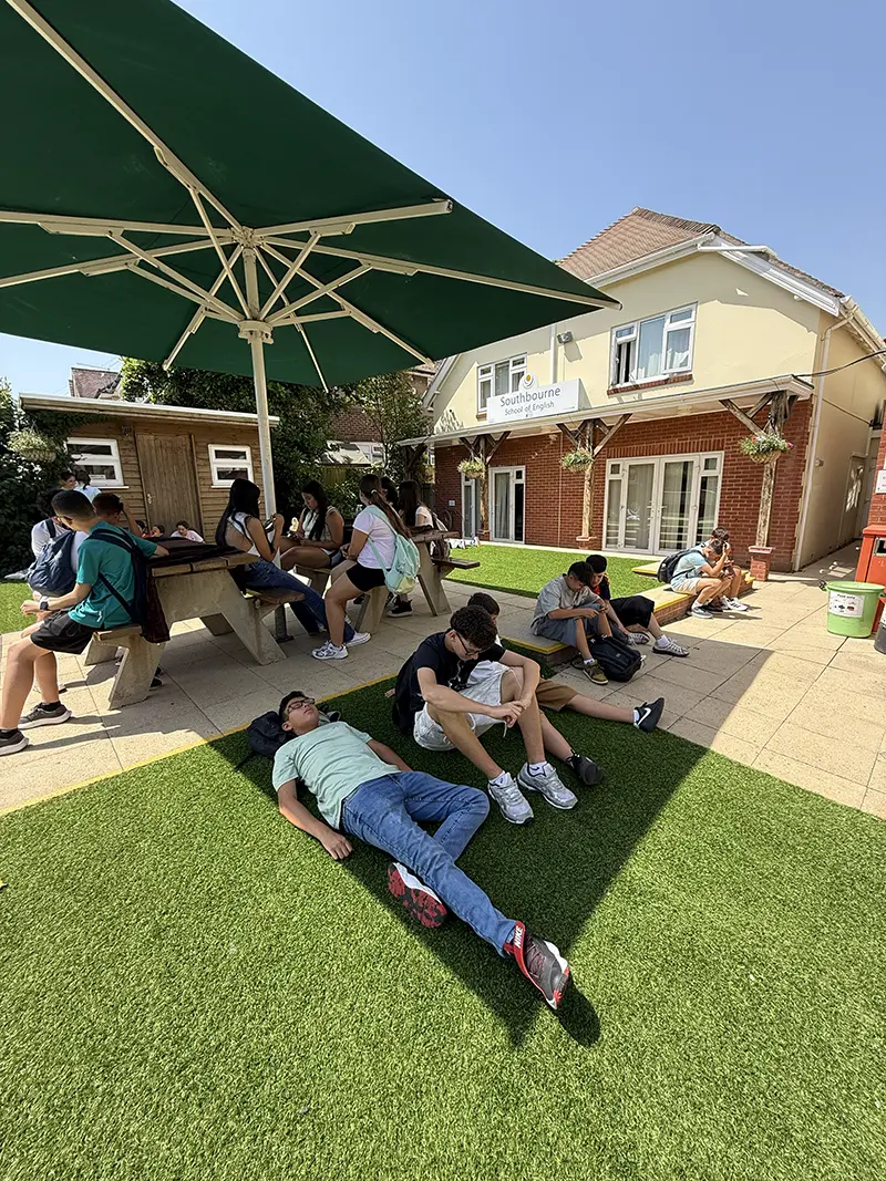 Students relaxing in the school garden